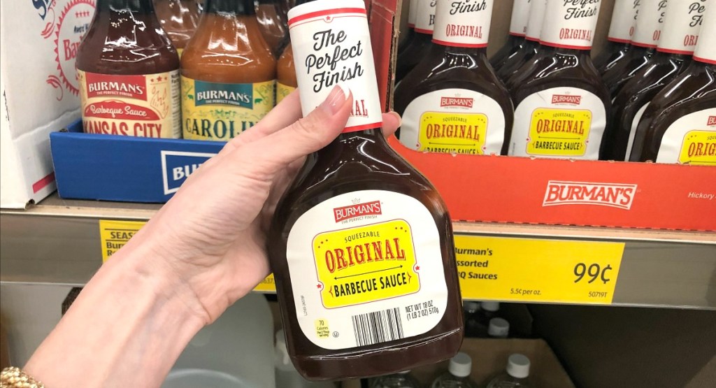 holding up barbecue sauce bottle