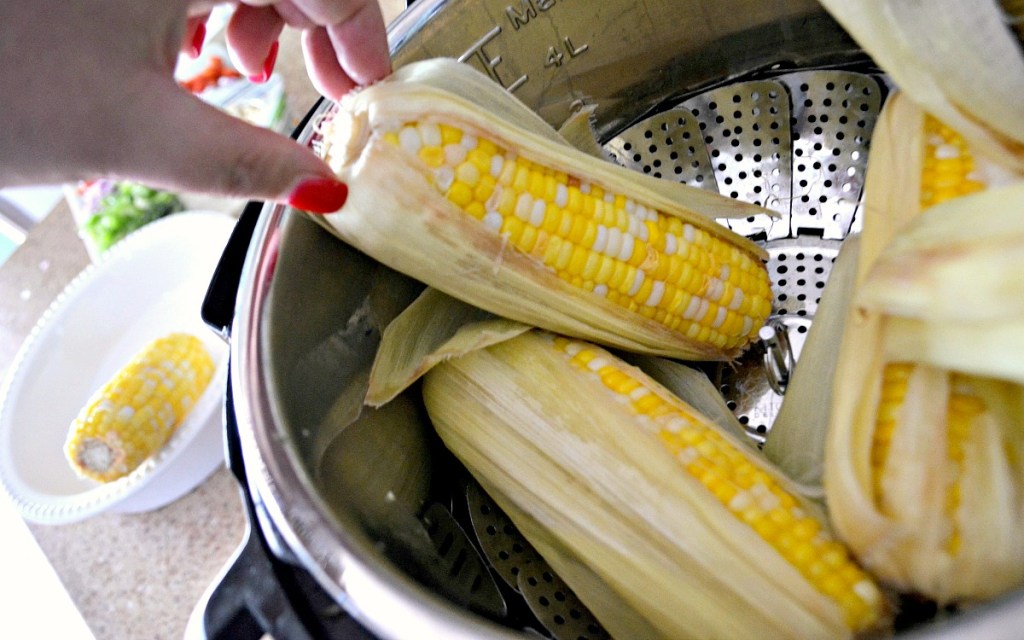 corn on the cob in a steaming basket