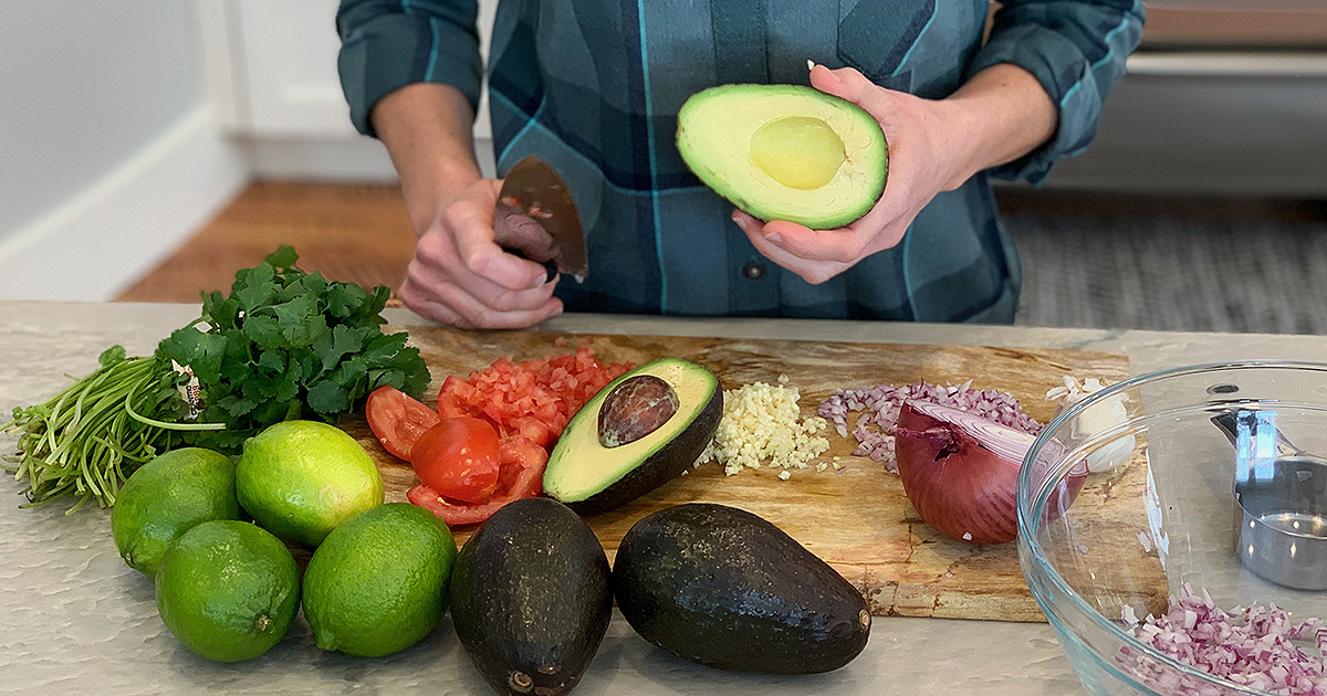 preparing vegetables for the keto guacamole recipe