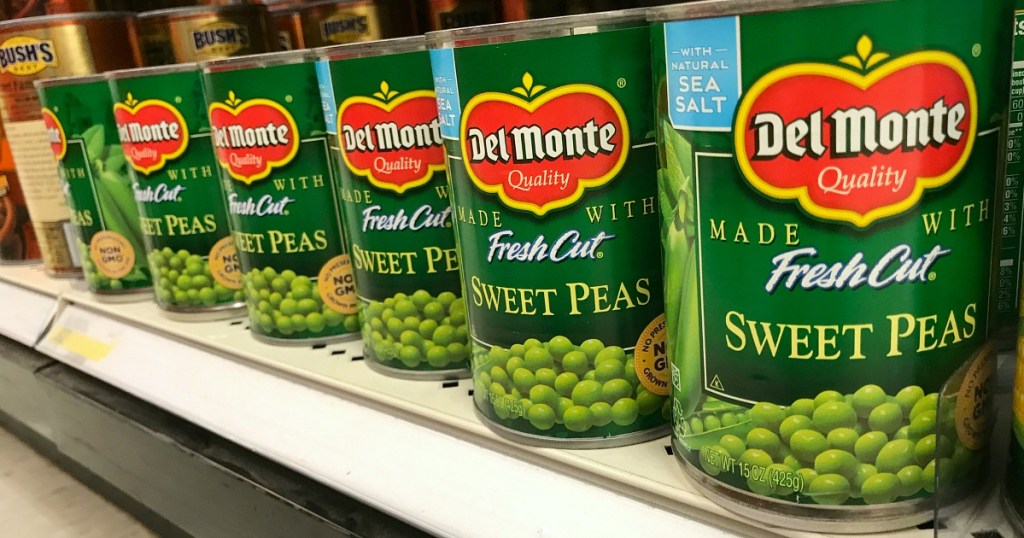 row of cans of delmonte green peas