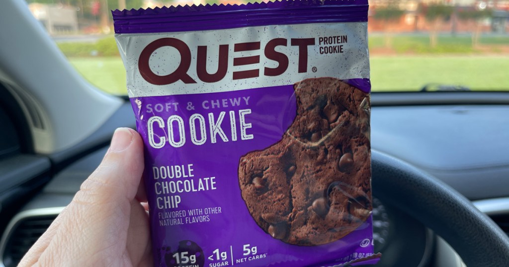 hand holding quest protein cookie