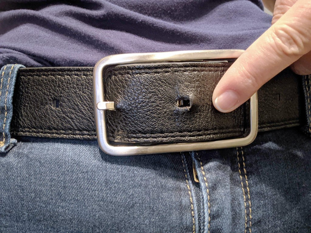 belt notch being tightened from weight loss