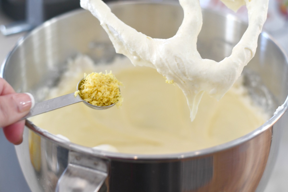 Adding lemon zest to the sugar free batter in the mixing bowl