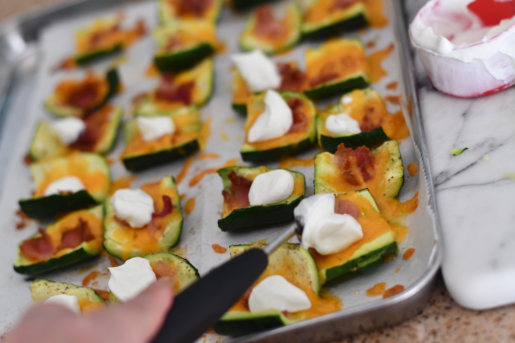 putting sour cream on keto loaded zucchini skins