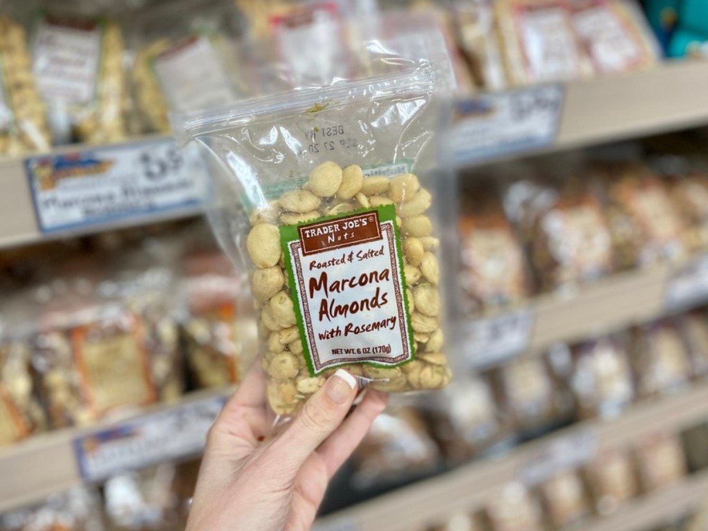 holding Marcona almonds at Trader Joe's