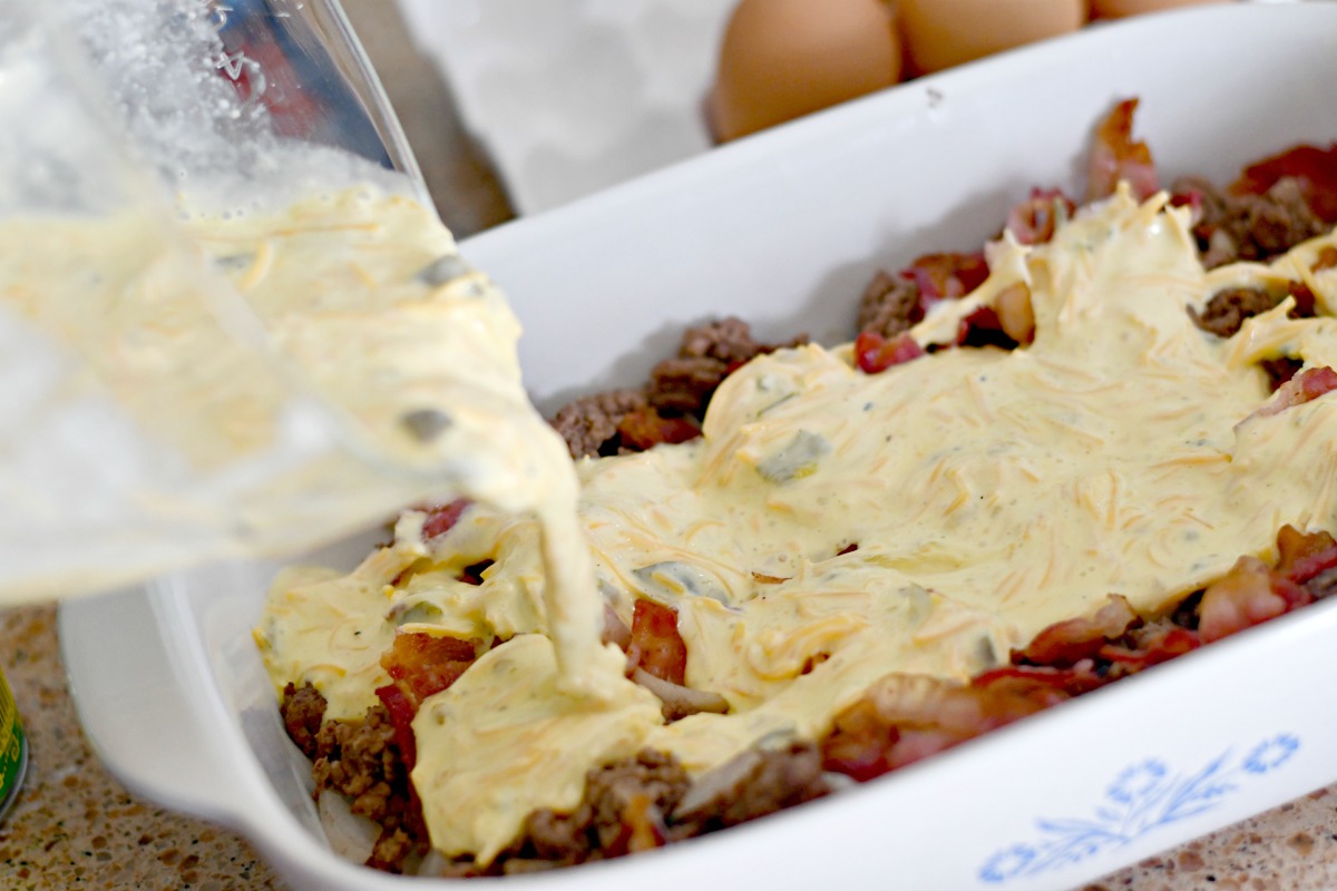 easy keto cheeseburger casserole recipe poured into the baking pan