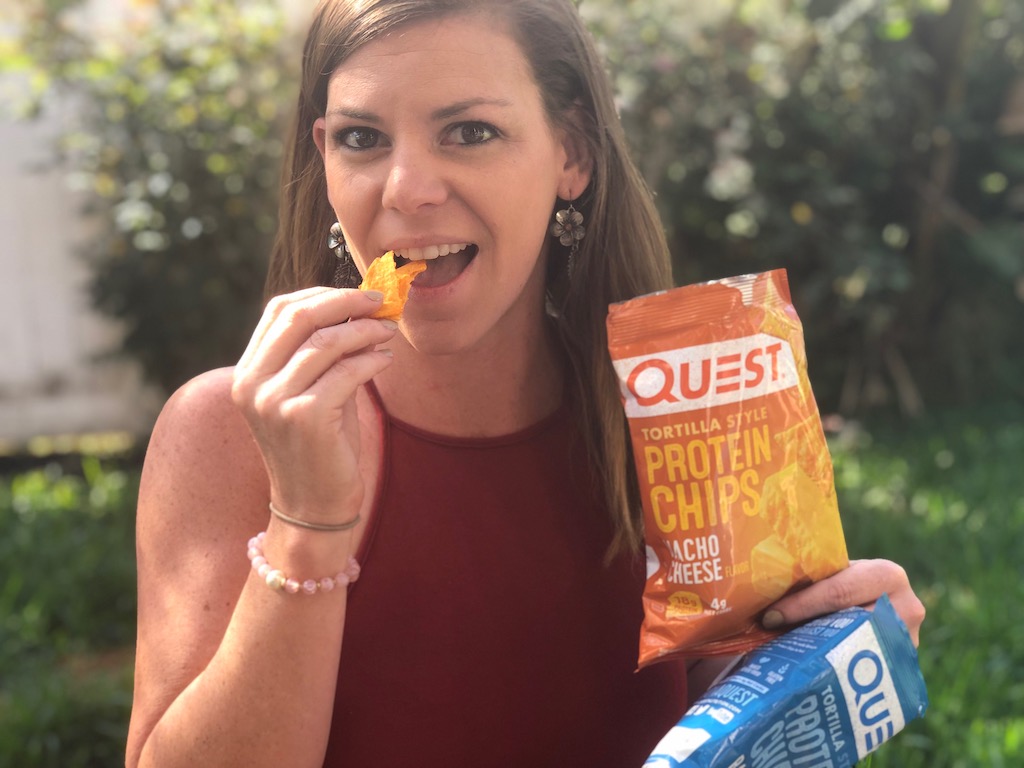 Woman eating quest chips