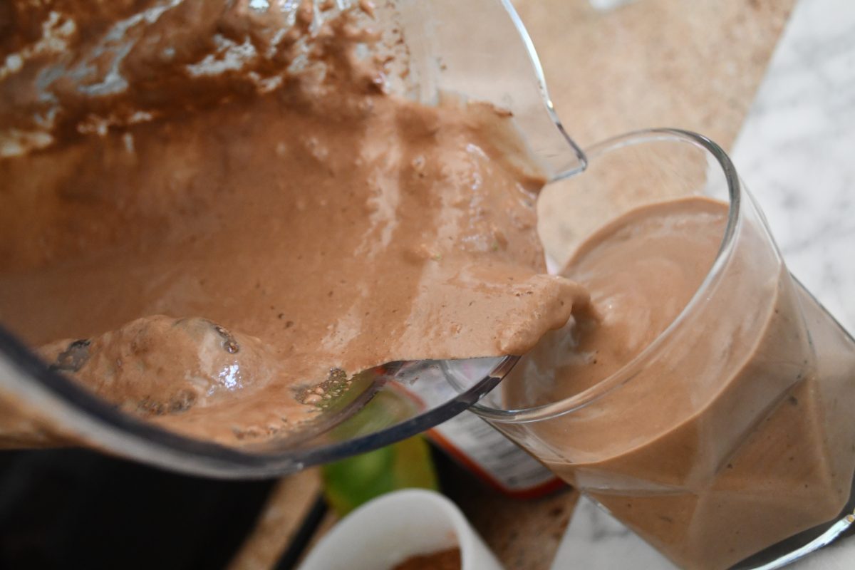 pouring the shake into a glass