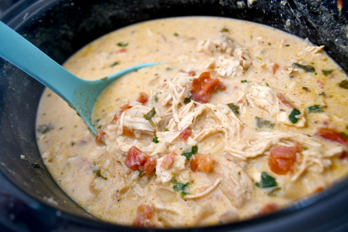 a ladle with cooked soup