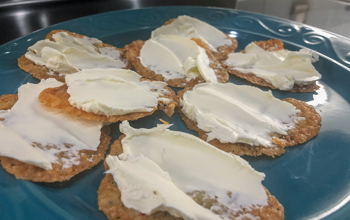 plate of pepperjack cheese crackers with cream cheese