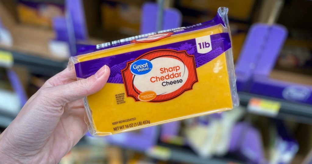 https://hip2keto.com/wp-content/uploads/sites/3/2019/03/holding-sharp-cheddar-cheese-block.jpg?resize=1024%2C538&strip=all