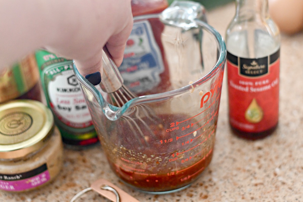 whisking the sauce together for instant pot general tso's chicken 