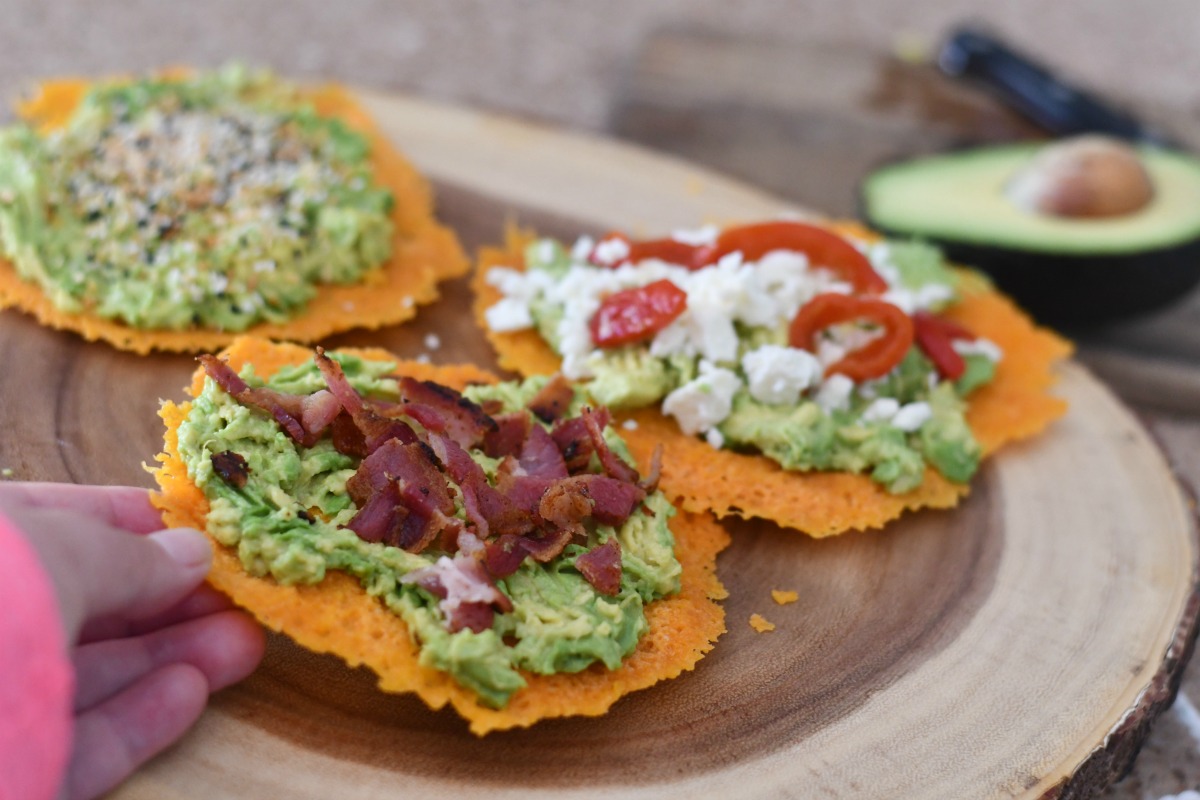 avocado cheese toast with different toppings