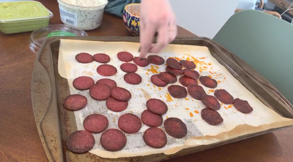 pepperoni chips on a baking sheet
