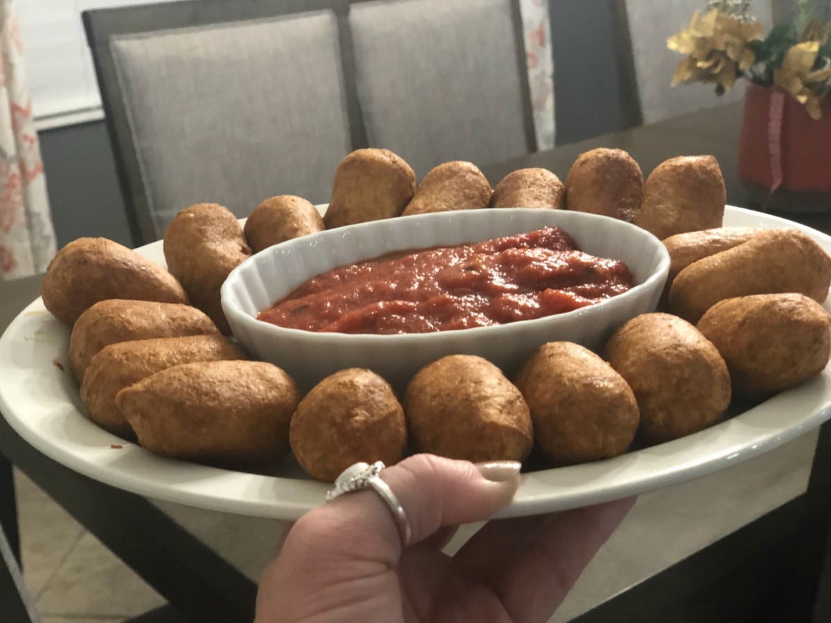 Real Good Poppers on a serving tray with marinara