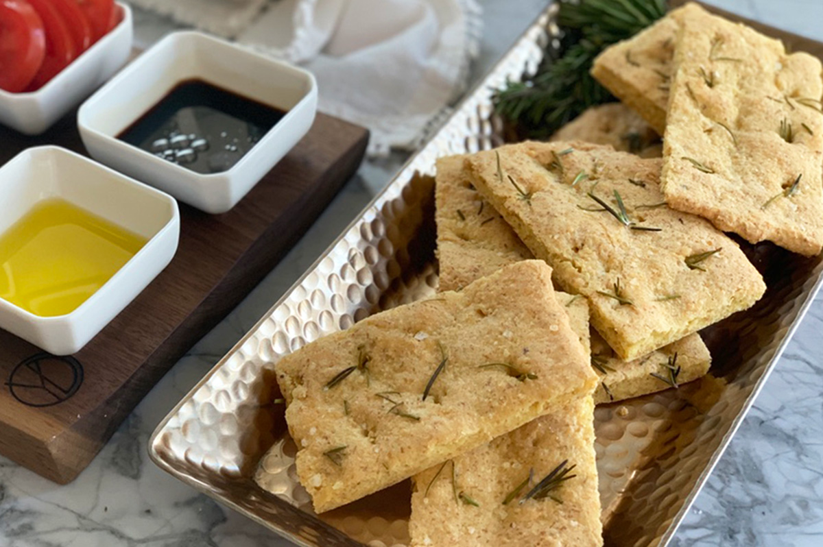 keto rosemary focaccia bread served with olive oil and vinegar