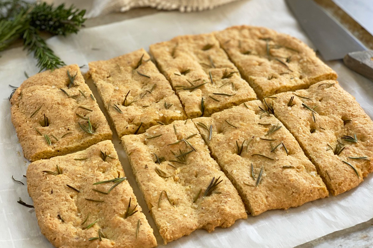 keto rosemary focaccia bread, warm from the oven, cut into pieces