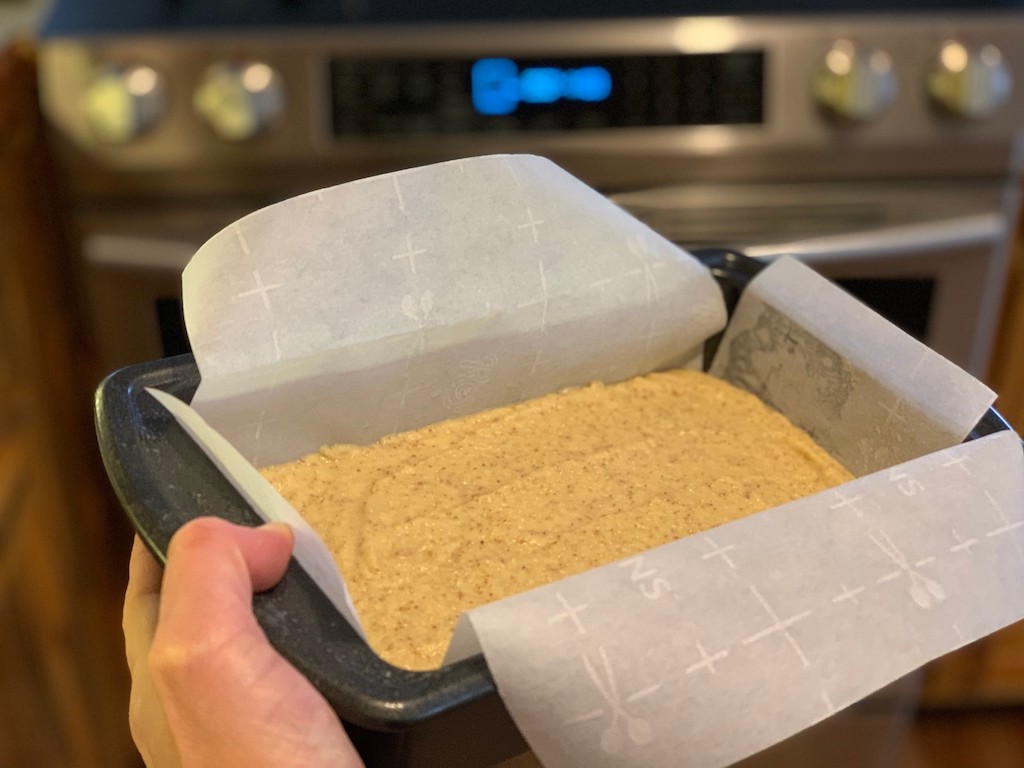 Putting keto bread in the oven 