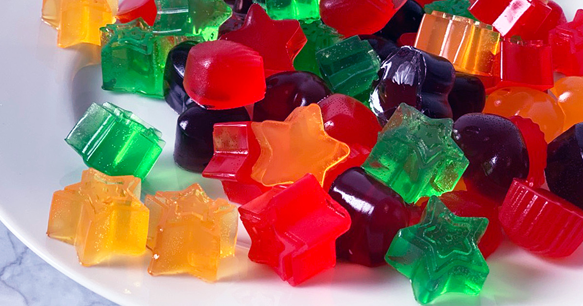 a plate of very colorful sugar free jello jiggler shapes