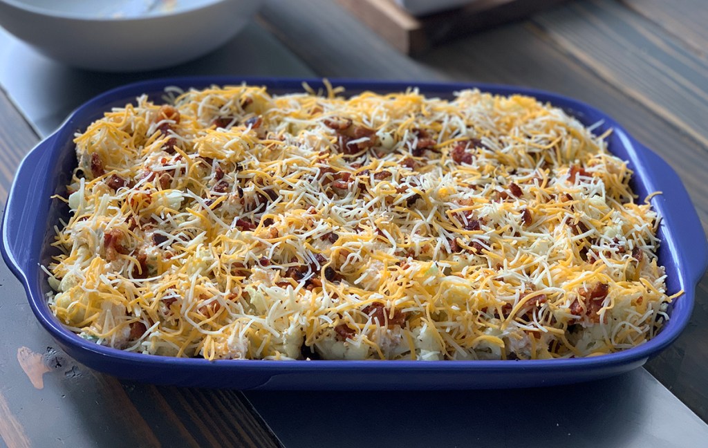 cauliflower casserole covered in cheese