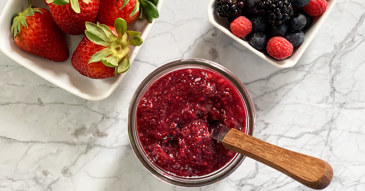fresh berries on a counter with very berry keto jam 