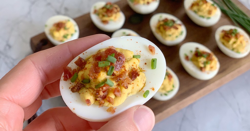 hand holding keto deviled egg