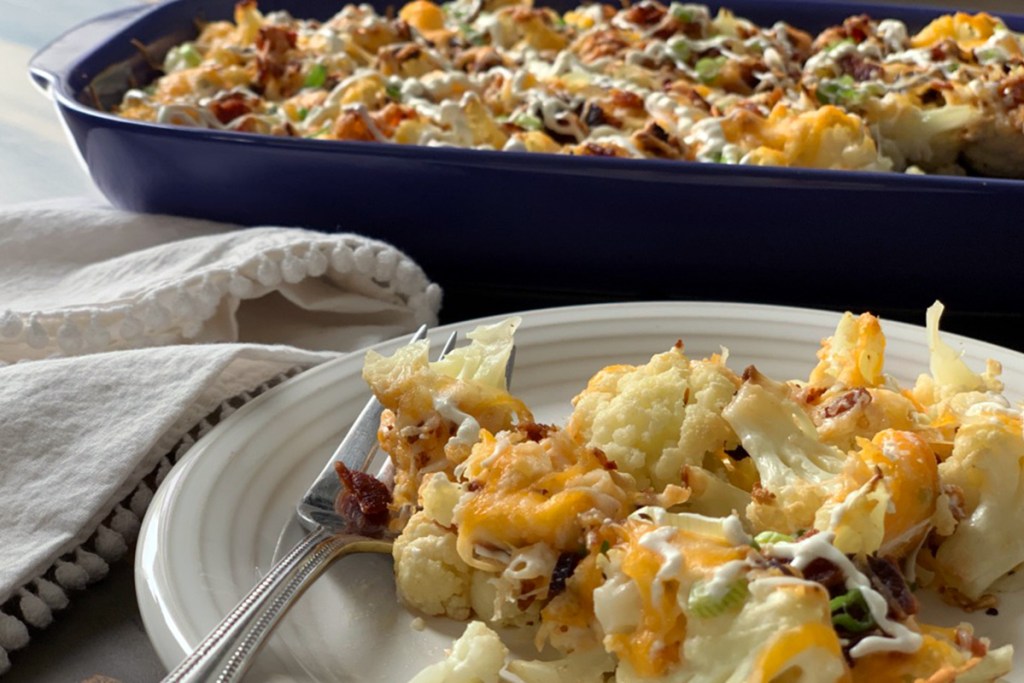 a plate with a serving of low carb loaded cauliflower casserole