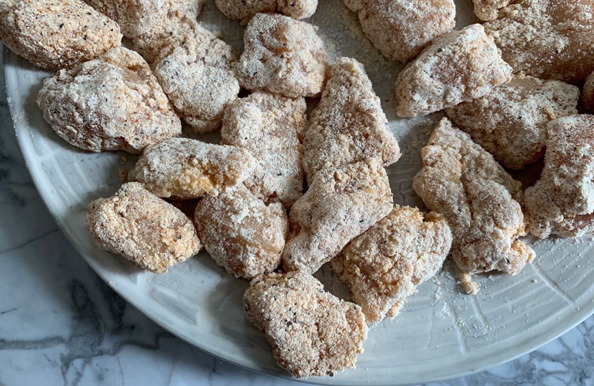 chicken bites coated with whey protein powder and seasonings