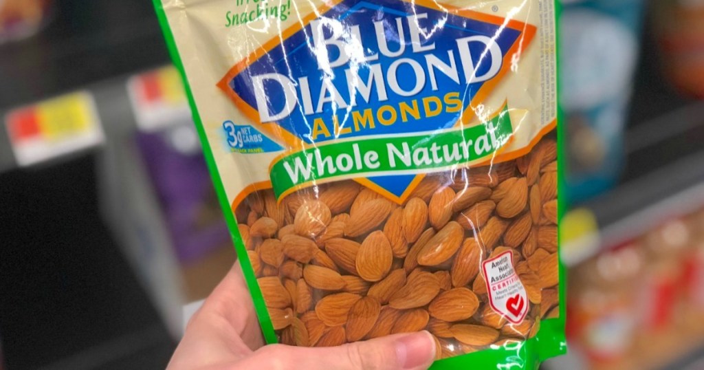 hand holding blue diamond almonds