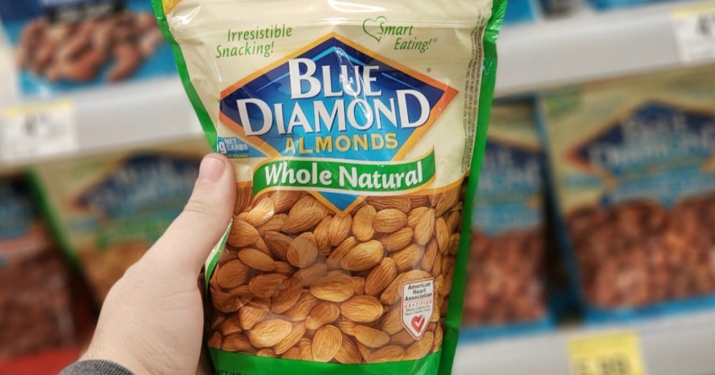 hand holding blue diamond almonds