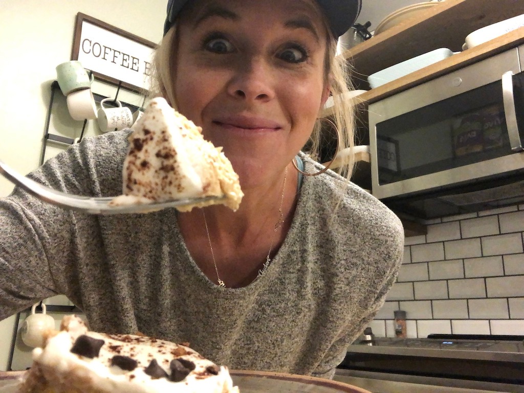 woman eating peabut butter pie 