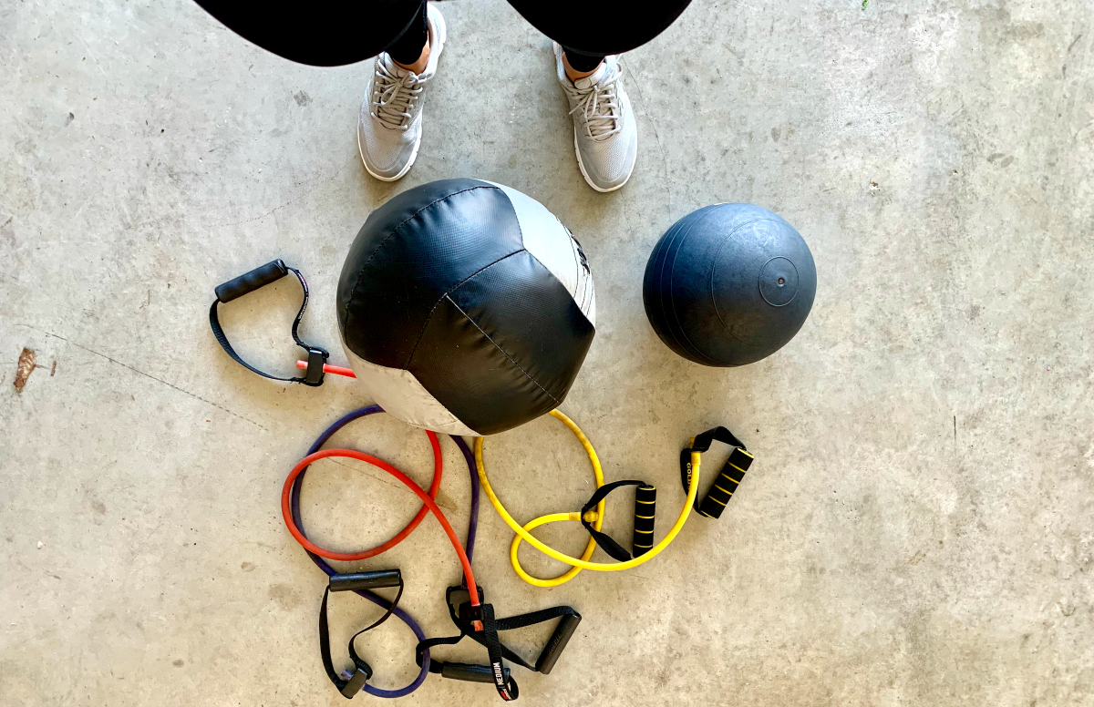 Find Your Trainer Session with medicine ball, bands, and other portable gym equipment