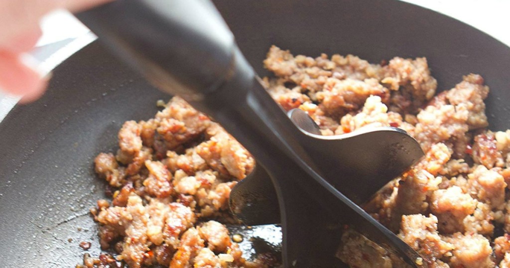 meat chopper in pan with ground beef
