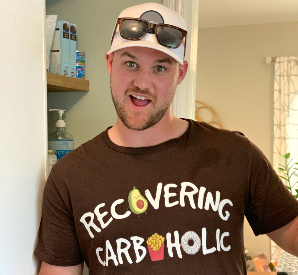 man wearing recovering carboholic tee