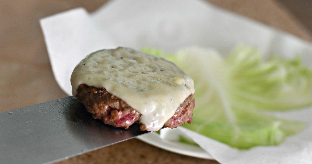 burger with havarti cheese wrapped in cabbage