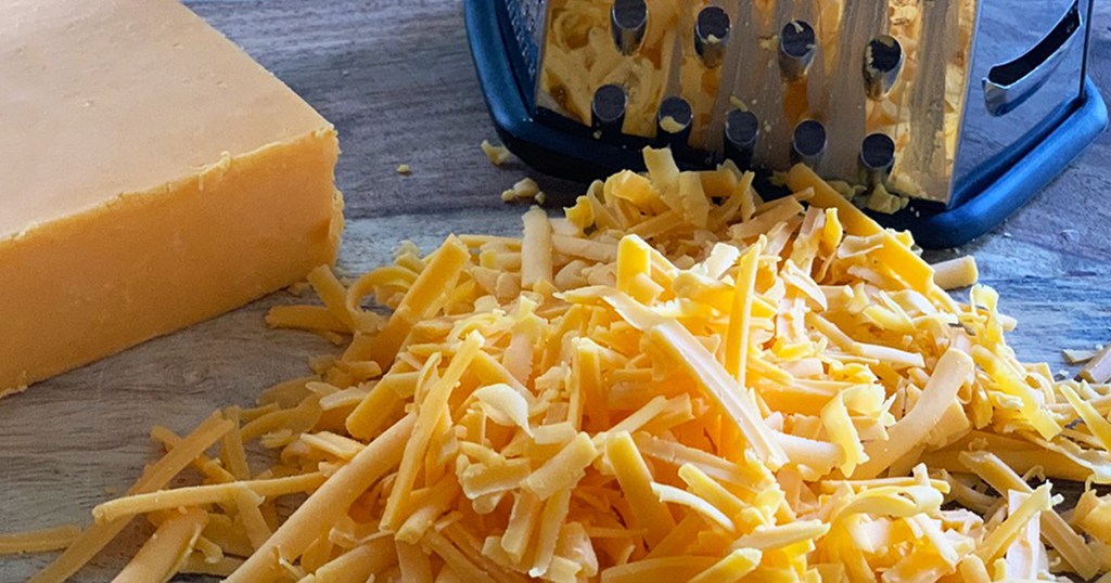 a block of freshly grated cheese