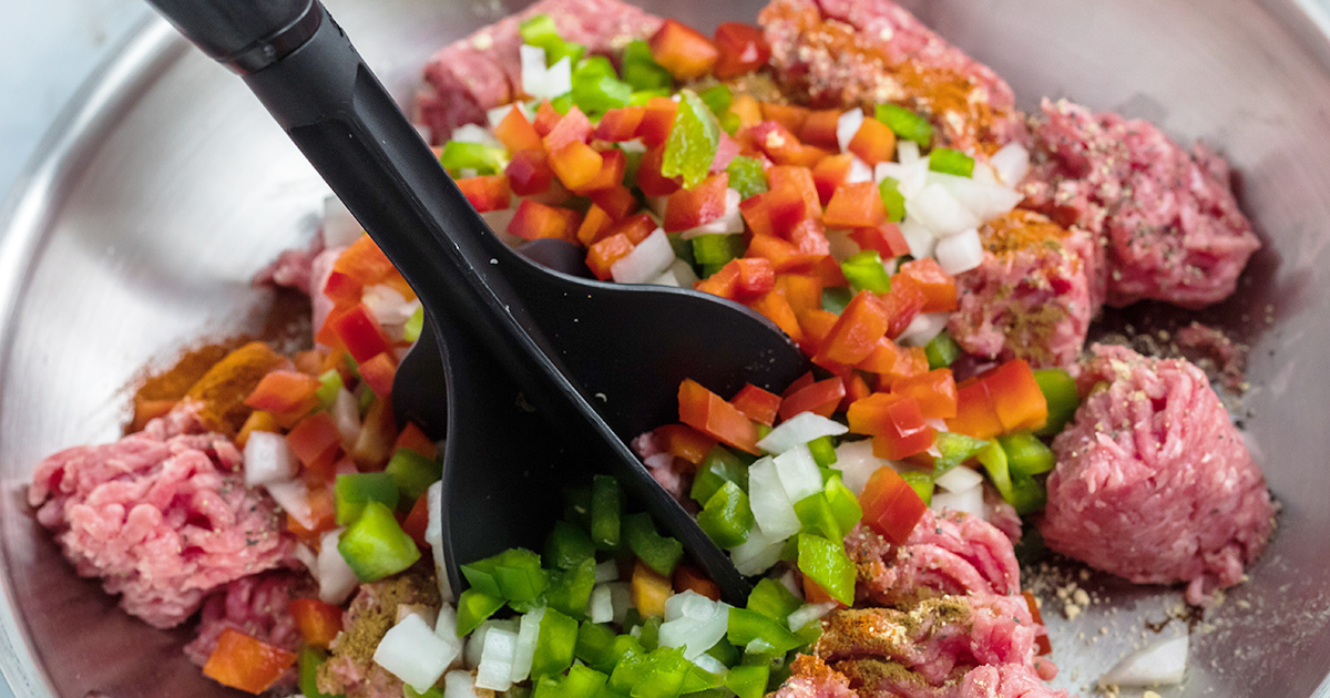 meat chopper in ground beef and veggies