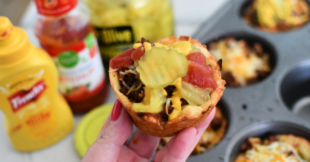 holding a keto cheeseburger muffin