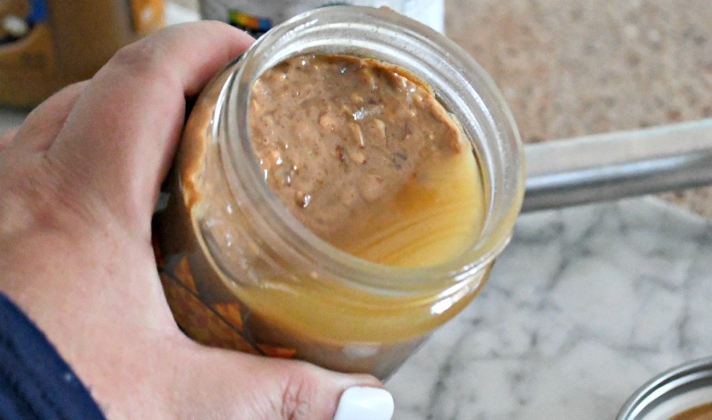 oily nut butter on the top of jar