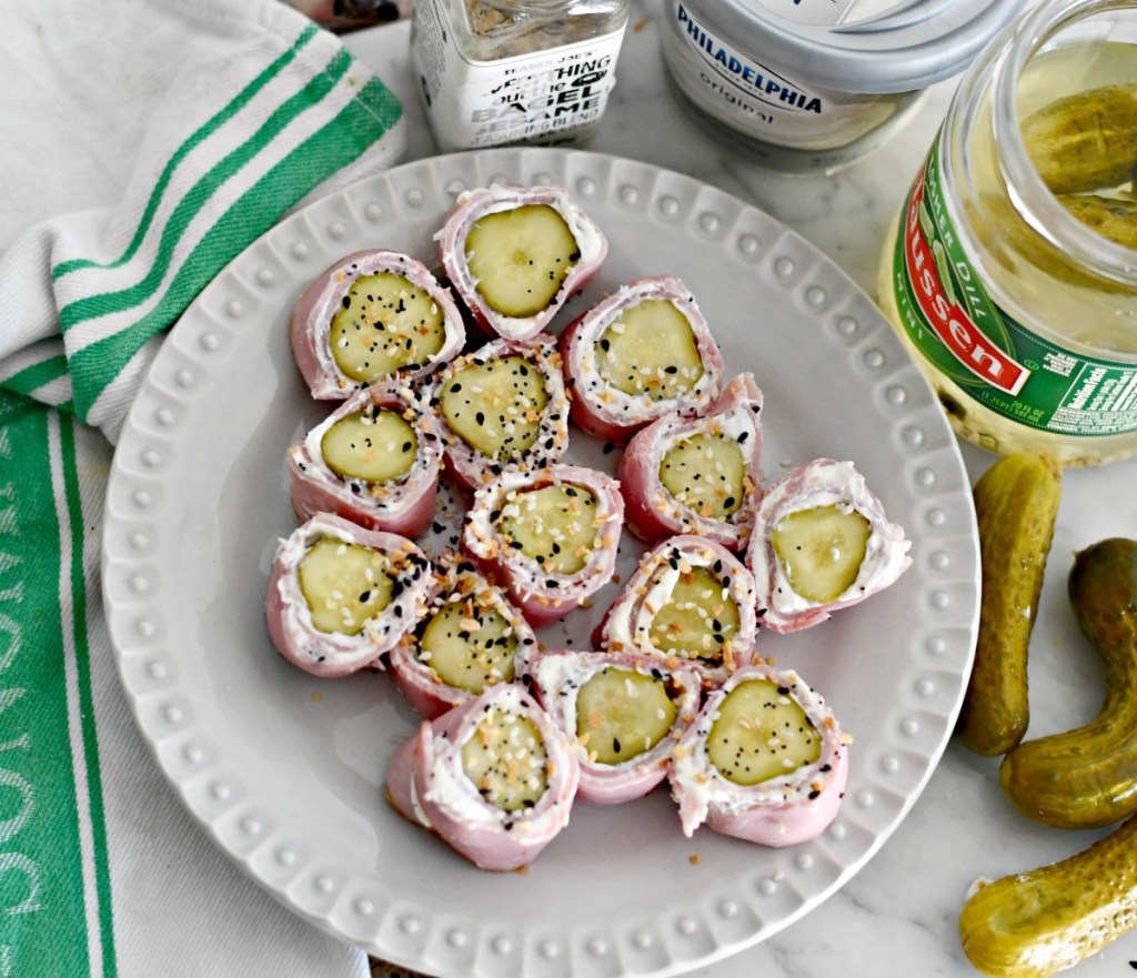 top view of keto pickle roll ups on a plate