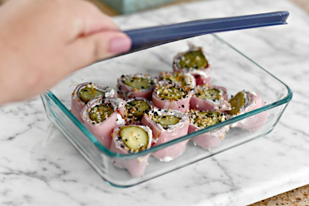 portable ham and pickle snack in tupperware