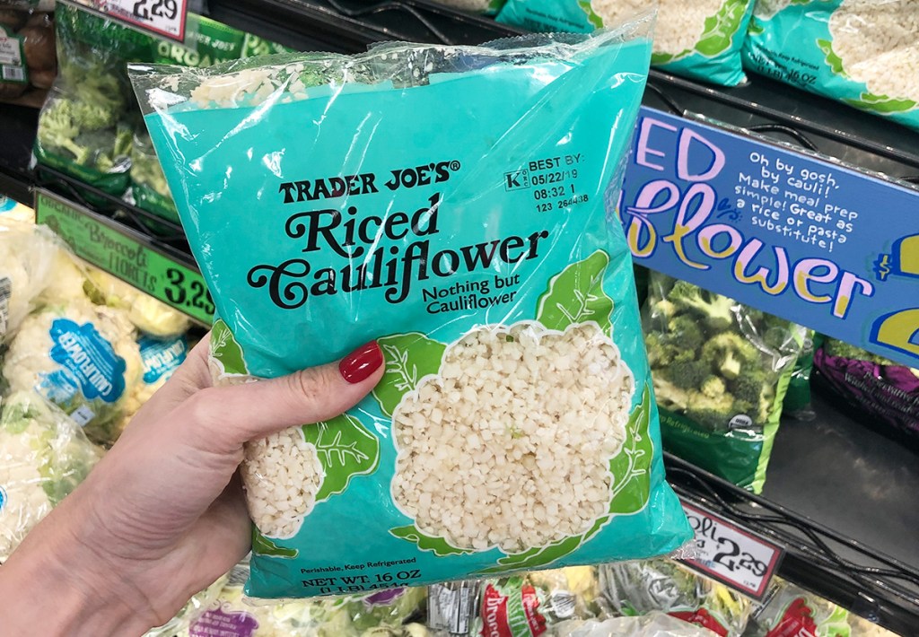 bag of riced cauliflower in produce section at trader joe's