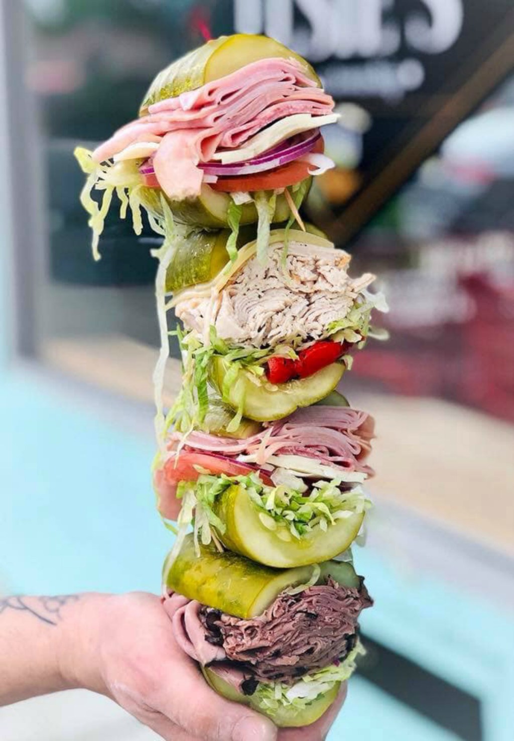 Elsie's pickle sandwiches stacked on top of each other