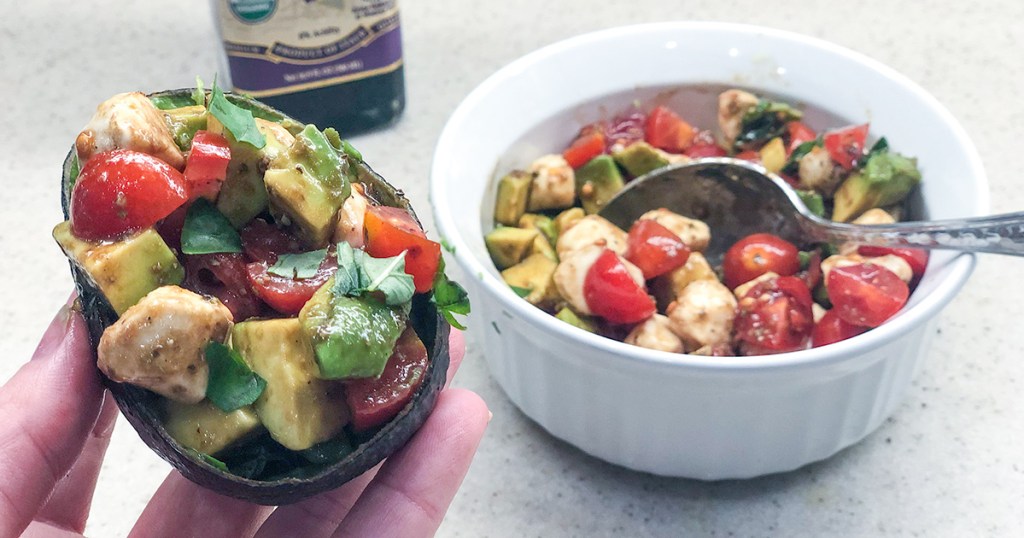 close up on caprese salad avocado boat