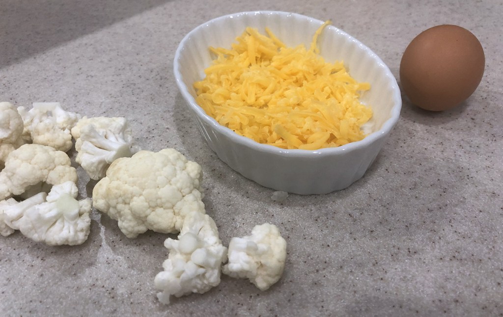 cauliflower, cheese, and an egg to make keto cauliflower english muffins