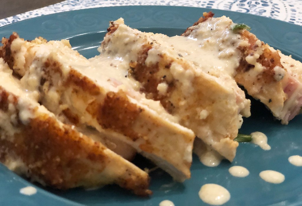 chicken cordon bleu finished with sauce