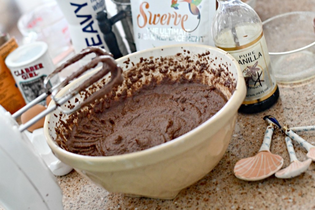 chocolate keto cake in a mixing bowl
