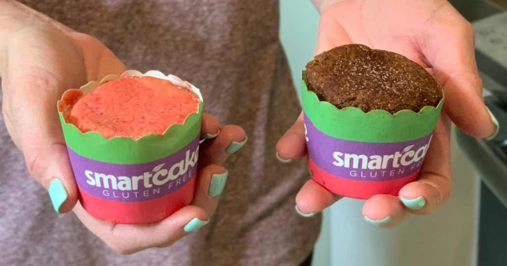 holding a Smartcake in either hand 