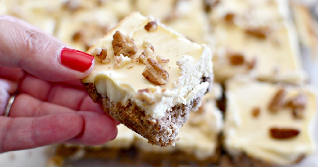 holding a cream cheese pecan keto bar