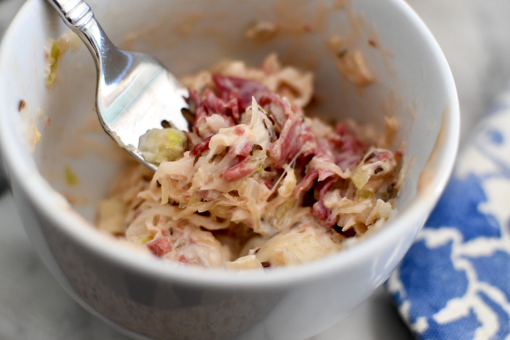 keto Reuben in a mug on fork 